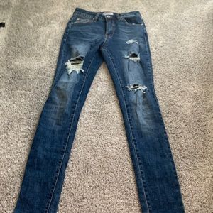 Dark blue ripped skinny jeans
